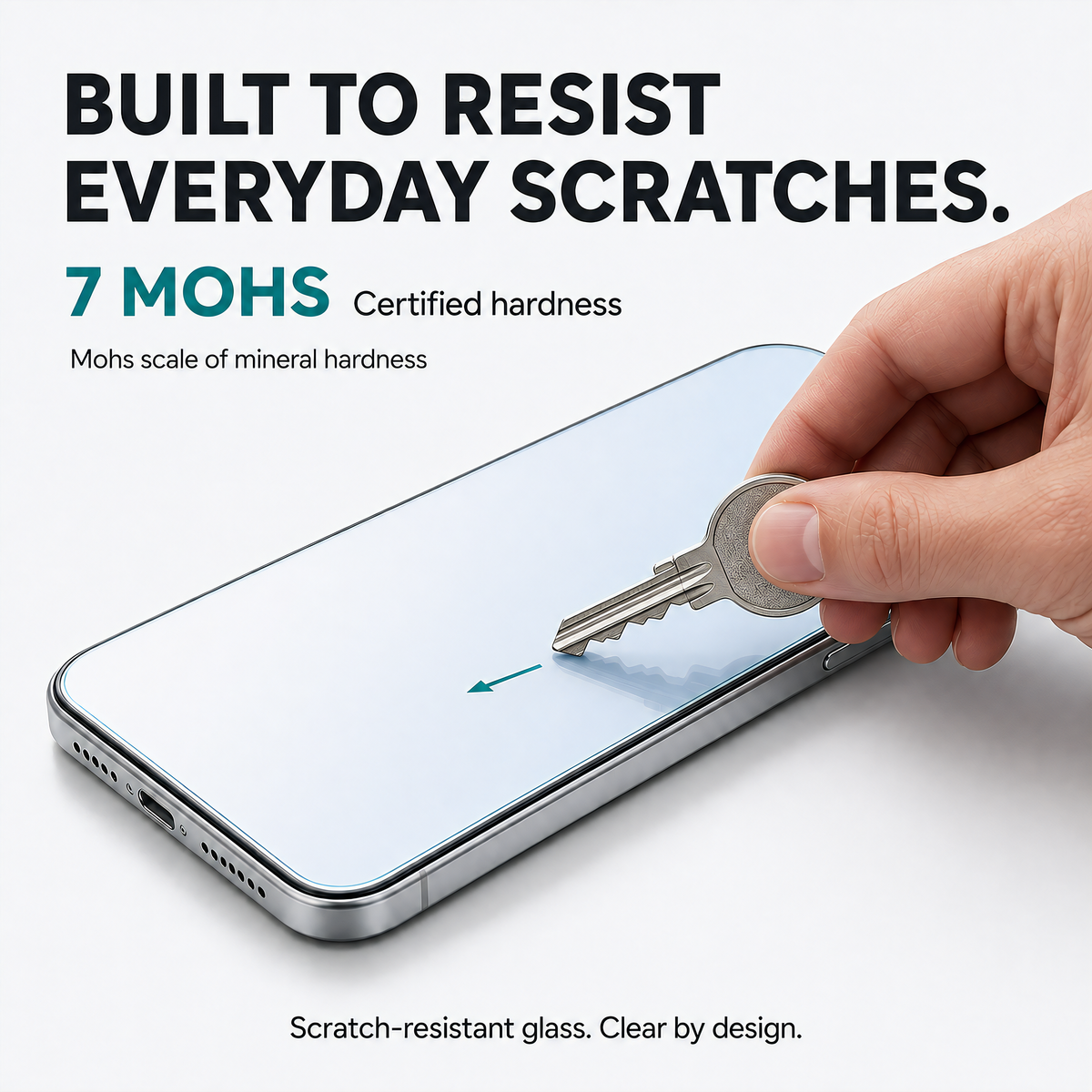 Tempered glass screen protector with 7 Mohs certified hardness resisting a key drawn across the screen.